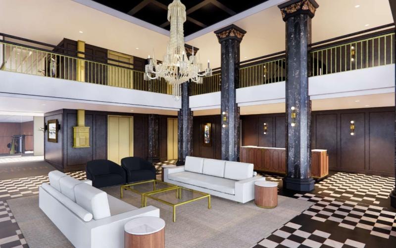 a lobby with couches and tables